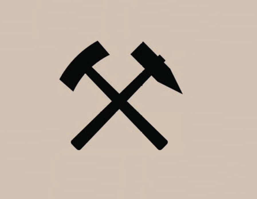 Grafika przedstawia godło górnicze w kolorze czarnym na brązowym tle